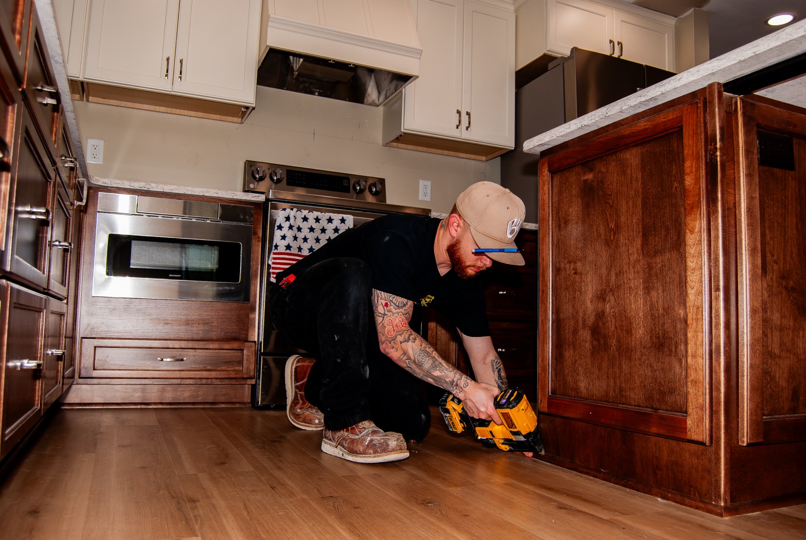 Huhn carpenter installing trim work on-site