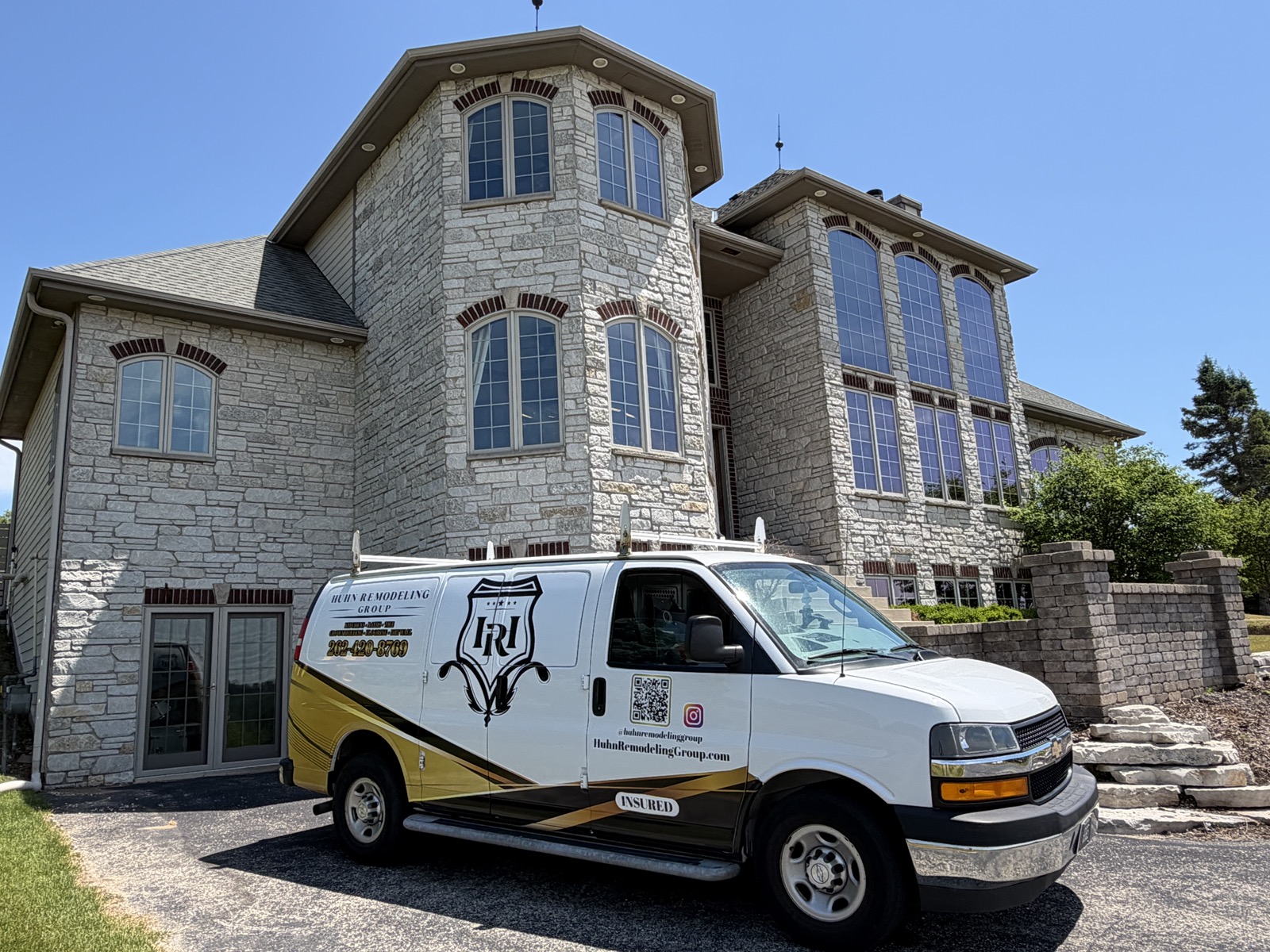 Huhn Remodeling Group company van at a recent project